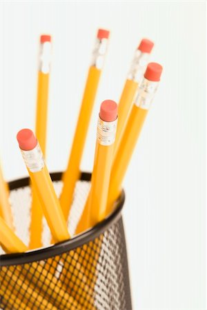 simsearch:400-03926140,k - Group of pencils in a pencil holder with eraser ends up. Photographie de stock - Aubaine LD & Abonnement, Code: 400-03926127