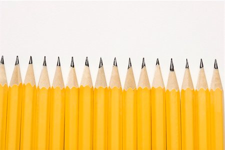 Sharp pencils lined up in an even row. Stockbilder - Microstock & Abonnement, Bildnummer: 400-03926135