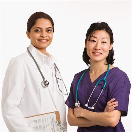 simsearch:685-02938515,k - Indian and Asian mid adult woman doctors portrait on white background. Stock Photo - Budget Royalty-Free & Subscription, Code: 400-03926394