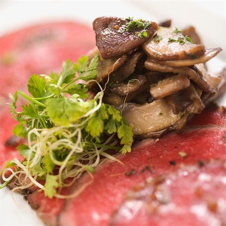 sliced mushroom - Pepper charred beef carpaccio with mushrooms. Stock Photo - Budget Royalty-Free & Subscription, Code: 400-03926541