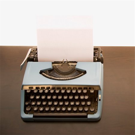 simsearch:400-03926032,k - Still life of blank sheet of paper in an old fashioned typewriter. Stock Photo - Budget Royalty-Free & Subscription, Code: 400-03926714