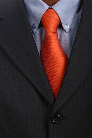 detail of a Business man Suit with red tie Stock Photo - Budget Royalty-Free & Subscription, Code: 400-03926780