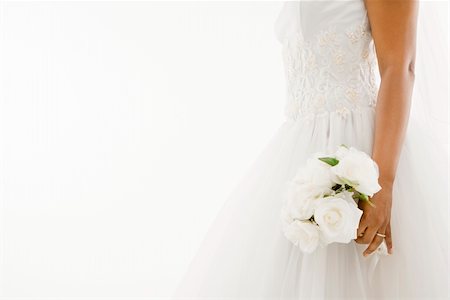 African-American bride holding bouquet. Stock Photo - Budget Royalty-Free & Subscription, Code: 400-03927154