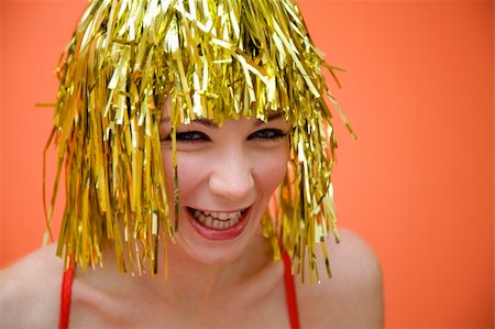 Holiday: beautiful girl having fun at a carnival party Stock Photo - Budget Royalty-Free & Subscription, Code: 400-03927286