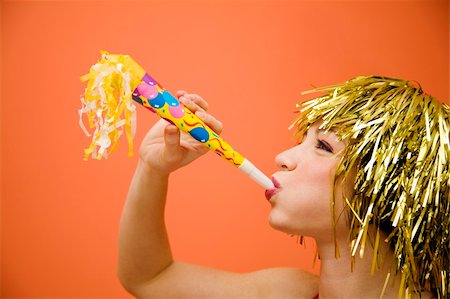 Holiday: beautiful girl having fun at a carnival party Stock Photo - Budget Royalty-Free & Subscription, Code: 400-03927363