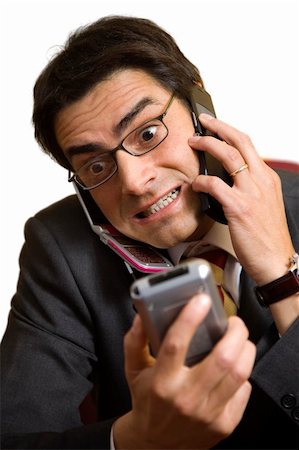 simsearch:6108-05868462,k - angry businessman screaming on the phone Stock Photo - Budget Royalty-Free & Subscription, Code: 400-03927871