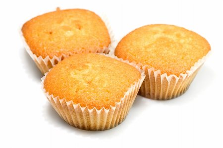 Three tasty muffins isolated on white background. Stock Photo - Budget Royalty-Free & Subscription, Code: 400-03927926