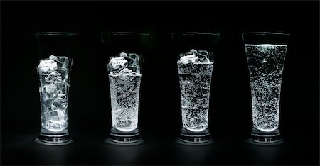 simsearch:400-03948575,k - Four glasses filled up with ice and water Stock Photo - Budget Royalty-Free & Subscription, Code: 400-03928067