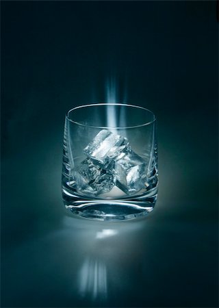 A glass with ice cubes Stock Photo - Budget Royalty-Free & Subscription, Code: 400-03928070