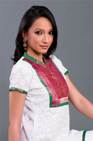 simsearch:400-05267422,k - A model wearing a tunic with traditional Indian brocade embroidery Photographie de stock - Aubaine LD & Abonnement, Code: 400-03928374