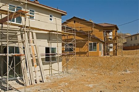 New residential construction in a subdivision of a new community Fotografie stock - Microstock e Abbonamento, Codice: 400-03928440