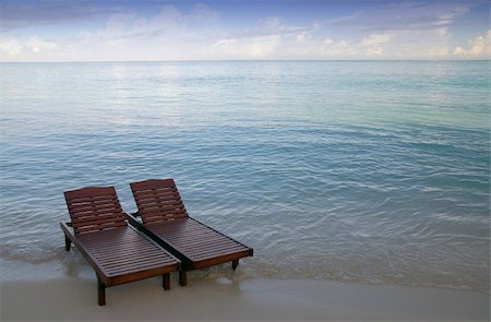 simsearch:400-03928487,k - canvas chairs in the sea on a maldivian beach Foto de stock - Royalty-Free Super Valor e Assinatura, Número: 400-03928461