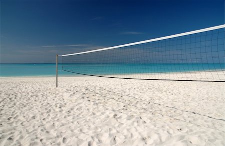 simsearch:841-07782436,k - Beach Volleyball net on white sand Stock Photo - Budget Royalty-Free & Subscription, Code: 400-03928473