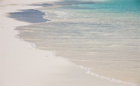 simsearch:628-00919233,k - waves splashing on a white sand beach of an maldivian island Stock Photo - Budget Royalty-Free & Subscription, Code: 400-03928495