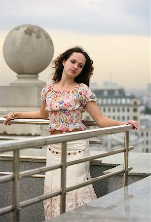 simsearch:400-04479015,k - Portrait of the thoughtful girl on a roof of a house Stock Photo - Budget Royalty-Free & Subscription, Code: 400-03928550