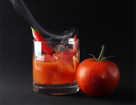 An icy hot cocktail with tomato juice, vodka and chili pepper. Stock Photo - Budget Royalty-Free & Subscription, Code: 400-03928987