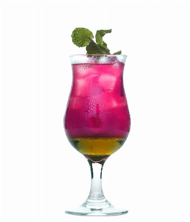 Colorful alcoholic cocktail in a glass against white background Stock Photo - Budget Royalty-Free & Subscription, Code: 400-03929008