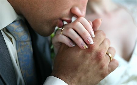 simsearch:400-03929021,k - The groom kisses a hand to the bride Stock Photo - Budget Royalty-Free & Subscription, Code: 400-03929149