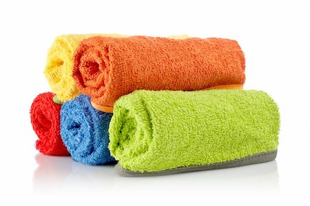 simsearch:400-05296034,k - Multicolour towels rolls reflected on white background Stock Photo - Budget Royalty-Free & Subscription, Code: 400-03929301