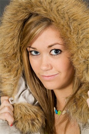 simsearch:400-04960190,k - Teenage girl posing on gray background with some attitude Stock Photo - Budget Royalty-Free & Subscription, Code: 400-03929612