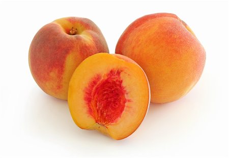 Whole and half peach (w clipping path) Stock Photo - Budget Royalty-Free & Subscription, Code: 400-03929690