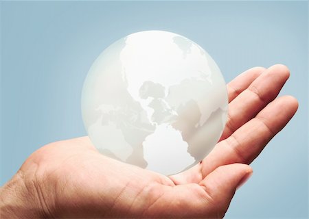 Hand holding globe Stock Photo - Budget Royalty-Free & Subscription, Code: 400-03920009