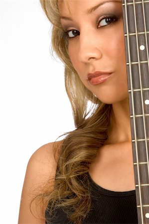 Portrait of Hispanic blonde Girl with guitar Fotografie stock - Microstock e Abbonamento, Codice: 400-03920045
