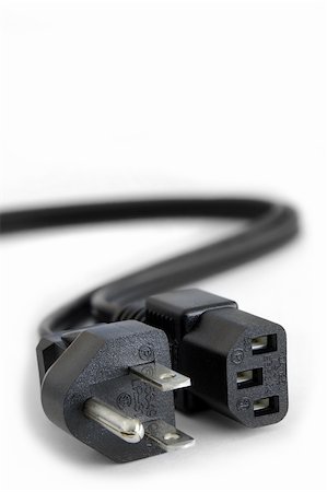 Power Plugs - close up on power cord extension cable Photographie de stock - Aubaine LD & Abonnement, Code: 400-03920656