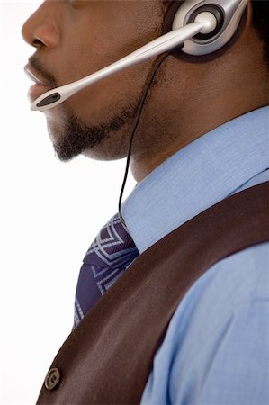 people talking queue - This is an image of a man with a microphone headset on. This image can be used for telecommunication and service themes. Stock Photo - Budget Royalty-Free & Subscription, Code: 400-03920684