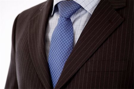 This is a close up of businessman wearing a tie, shirt, and suit. Fotografie stock - Microstock e Abbonamento, Codice: 400-03920689