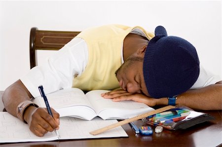 simsearch:400-05678149,k - This is an image of a student suffering from academic pressure. This image can be used to represent academic and student themes. Stockbilder - Microstock & Abonnement, Bildnummer: 400-03920691