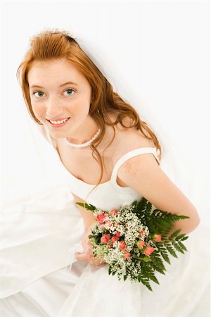 simsearch:400-04950359,k - Portrait of a Caucasian bride holding bouquet. Stock Photo - Budget Royalty-Free & Subscription, Code: 400-03921439