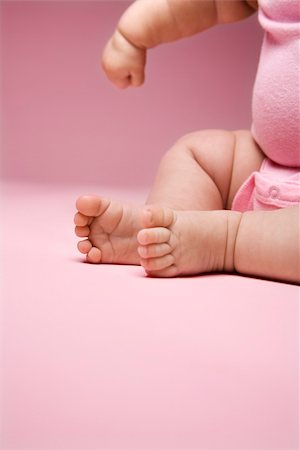 Close up of Asian babys legs and feet and arm. Stock Photo - Budget Royalty-Free & Subscription, Code: 400-03921510