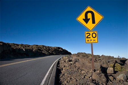 simsearch:400-04446168,k - Road and curve in road sign in Haleakala National Park, Maui, Hawaii. Stockbilder - Microstock & Abonnement, Bildnummer: 400-03921758