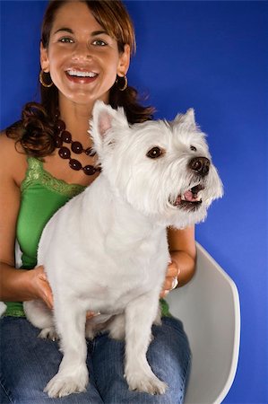 simsearch:400-04446187,k - Caucasian prime adult female holding white terrier dog. Photographie de stock - Aubaine LD & Abonnement, Code: 400-03921776