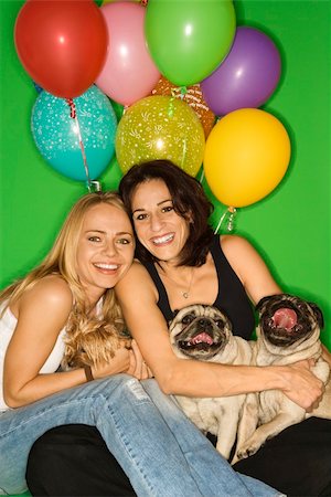 simsearch:400-04446187,k - Caucasian prime adult and young adult females with small dogs and festive balloons. Photographie de stock - Aubaine LD & Abonnement, Code: 400-03921822