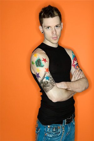 Young adult Caucasian male with tattoos. Stock Photo - Budget Royalty-Free & Subscription, Code: 400-03921843