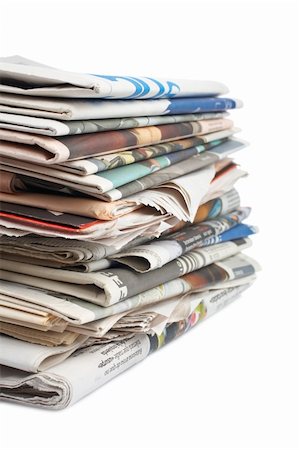simsearch:400-07774296,k - A stack of local newspapers with focus on front. Shallow DOF Stockbilder - Microstock & Abonnement, Bildnummer: 400-03922126