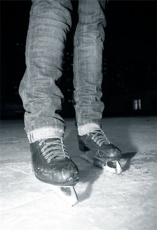 skating ice background - Female legs in jeans and skates Stock Photo - Budget Royalty-Free & Subscription, Code: 400-03922478