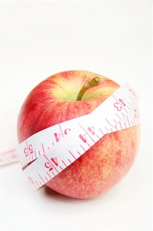 simsearch:400-05907063,k - Measurement tape wrapped around red apple - health, diet Stock Photo - Budget Royalty-Free & Subscription, Code: 400-03922870