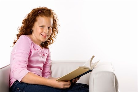 simsearch:400-03923096,k - Caucasian female child sitting reading book. Stock Photo - Budget Royalty-Free & Subscription, Code: 400-03923096