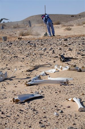 dead people in deserts - deminer in action cleaning the area from mines Stock Photo - Budget Royalty-Free & Subscription, Code: 400-03923233