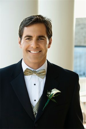 Portrait of Caucasian mid-adult groom in tuxedo smiling. Stock Photo - Budget Royalty-Free & Subscription, Code: 400-03923447