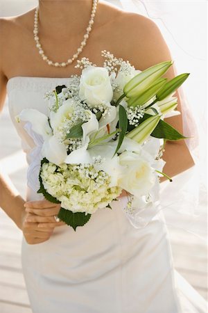 string of pearls for wedding - Caucasian mid-adult bride holding flower bouquet. Stock Photo - Budget Royalty-Free & Subscription, Code: 400-03923442