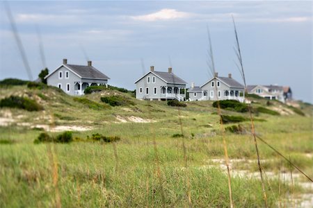 simsearch:400-03923118,k - Scenic houses at coast of Bald Head Island, North Carolina. Fotografie stock - Microstock e Abbonamento, Codice: 400-03923531