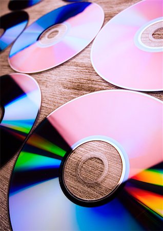 simsearch:400-03950272,k - Cd disk is a very important part of computer communication. Photographie de stock - Aubaine LD & Abonnement, Code: 400-03934534