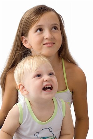 simsearch:400-03952911,k - Portrait of the laughing child with the sister Stock Photo - Budget Royalty-Free & Subscription, Code: 400-03934778