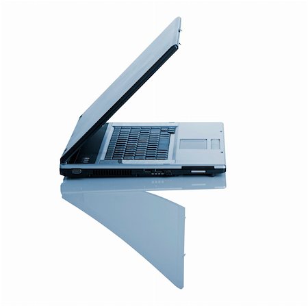 simsearch:400-06851376,k - Picture of a laptop on a white background with reflection Stock Photo - Budget Royalty-Free & Subscription, Code: 400-03935195