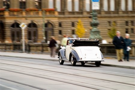 An old antique car gving tours in old town Prague. Stock Photo - Budget Royalty-Free & Subscription, Code: 400-03936426