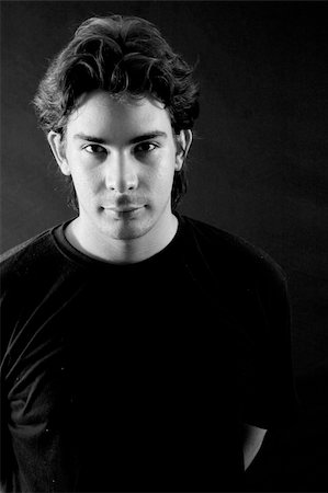 smiling young latina models - Young male portrait with serious expression in black and white Photographie de stock - Aubaine LD & Abonnement, Code: 400-03936449